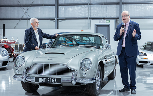 Terry Smith with H.E. Paul Brummell CMG speaking about the Aston Martin DB5.jpg